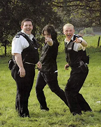 Simon Pegg and Nick Frost in Hot Fuzz silly pose on set 16x20 Poster