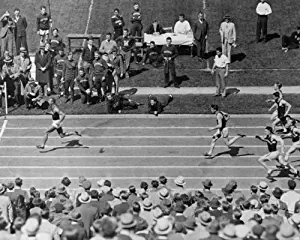 1935 photo Jesse Owens with substantial lead in hundred-yard dash in Dyche St e6