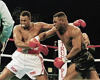 Mike Tyson Larry Holmes throwing punch boxing legends 8x10 Promotional Photograph